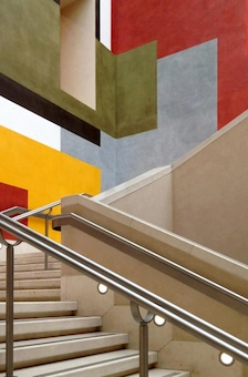 Stairs with a colourful wall